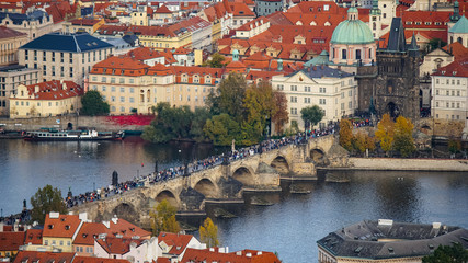 Fototapeta na wymiar Aerial view of the Old Town architecture with red roofs in Prague , Czech Republic. Vltava river. old town panorama , Czech republic.