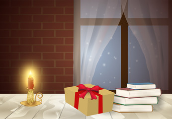 Candelabra with pile of book and gift box on the table in winter season background