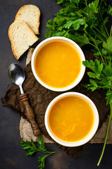 Bowls of hot vegetarian red lentil soup