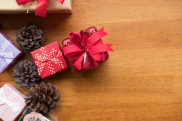 present boxes and pine cone. gift box for xmas party. christmas and new year holiday celebration.