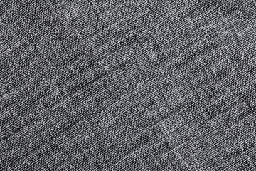 Gray fabric closeup canvas pattern background.