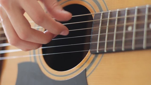guitar closeup, hand of musician