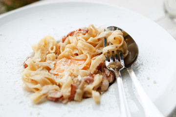 Traditional italian pasta carbonara with bacon and egg