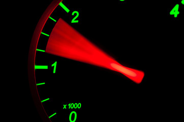 Tachometer close up shot in red and green colors on  real car.