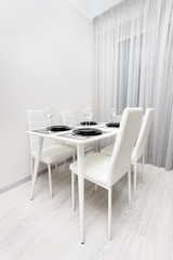 Obraz na płótnie Canvas minimalistic served white table