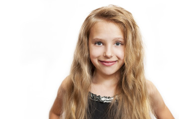 Portrait of a cute young blonde girl on a white background
