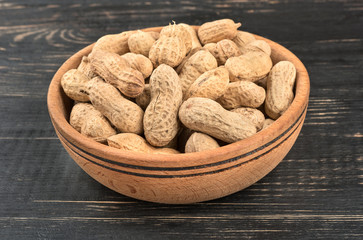 Peanuts in shell bowl