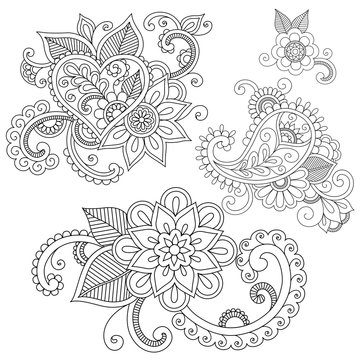 Set of floral doodle ornaments.