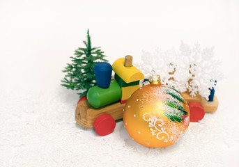 Christmas decoration on abstract background. Christmas tree on toy train.