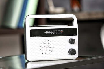 Fototapeta premium Retro radio on table in room