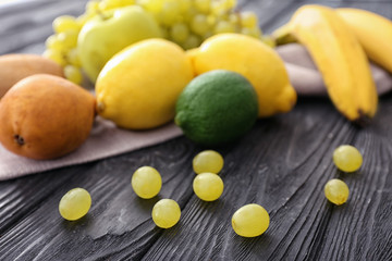 Fresh fruits on wooden table