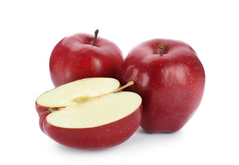 Ripe red apples on white background