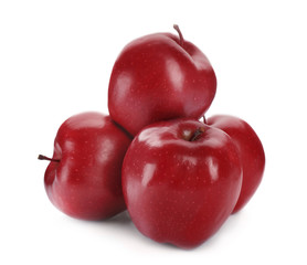 Ripe red apples on white background