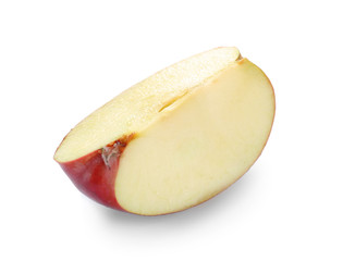Piece of ripe red apple on white background