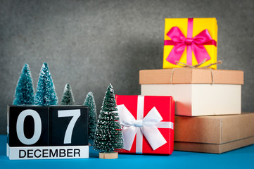 December 7th. Image 7 day of december month, calendar at christmas and new year background with gifts and little Christmas tree