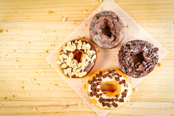 Donuts on wooden background