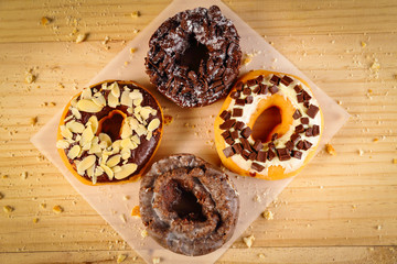 Donuts on wooden background