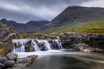 Fototapeta na wymiar Beautiful waterfalls in Scotland mountains
