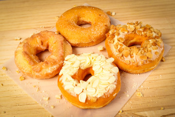 Donuts on wooden background