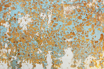 Surface of the wall are covered with old shabby paint background