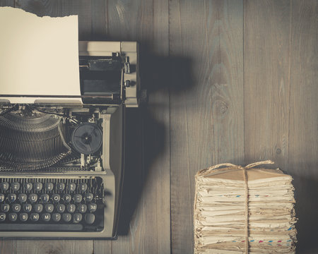 Old Typewriter And A Stack Of Old Letters