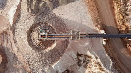 Stone grinder in a large Quarry - Top down aerial view