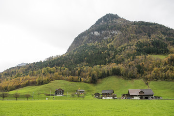 Fototapeta na wymiar Engelberg, Switzerland, October 29;2017; Beautiful view of countryside village and mountain at autumn in Engelberg, Switzerland