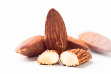 Closeup of almonds, isolated on the white background