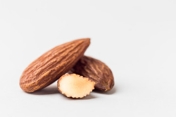 Closeup of almonds, isolated on the white background