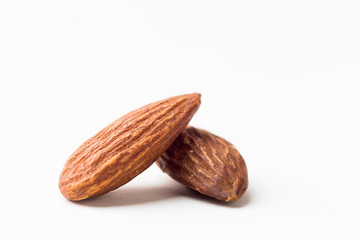 Closeup of almonds, isolated on the white background