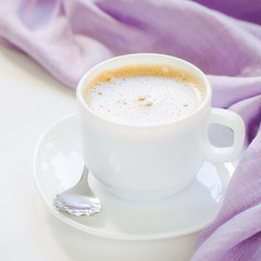 White cup of morning coffee or cappuccino