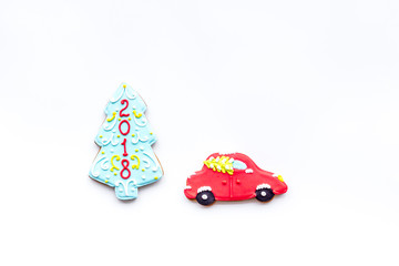 New Year Eve's recipes. Gingerbread cookies with confictionery glaze on white background top view copyspace