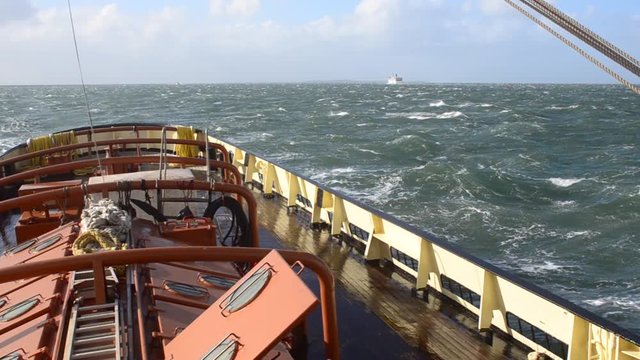 historic salvation tug boat in stormy weather
