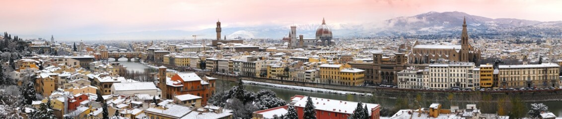 Beautiful cityscape of Florence during winter season. Old Bridge, Old Palace of Signoria, Cathedral of Santa Maria del Fiore and Basilica of the Holy Cross. Florence from Piazzale Michelangelo, Italy.