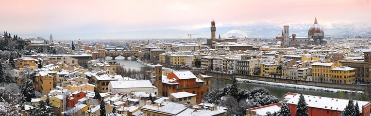 Beautiful cityscape with snow of Florence during winter season. Old Bridge, Old Palace of Signoria and Cathedral of Santa Maria del Fiore. Florence from Piazzale Michelangelo, Italy.