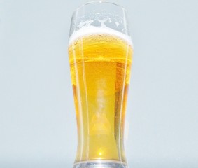 glass of beer on a white background