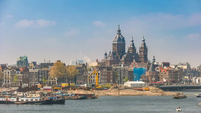 Amsterdam city skyline timelapse with Basilica of Saint Nicholas, Amsterdam, Netherlands 4K Time Lapse