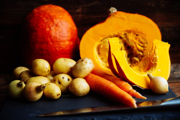 Vegetables for preparation of pumpkin soup , white background