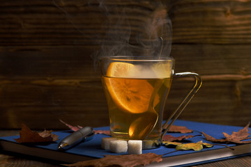 Autumn beauty and drink concept. Cup of green tea