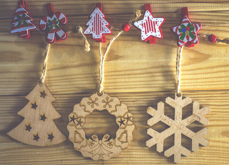 festive wooden toys on a wooden background