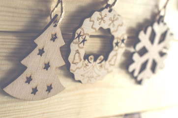 festive wooden toys on a wooden background