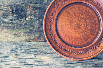 Clay dish on a wooden table