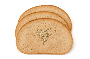 Brotscheiben und Roggenkörner
