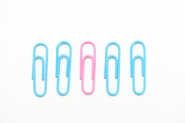 Colorful paper clips on white background.