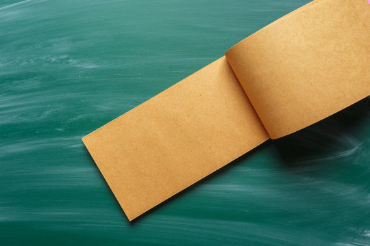 note paper on chalkboard for text