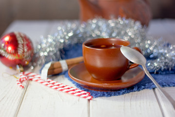 Beautiful christmas tea on white wooden table.