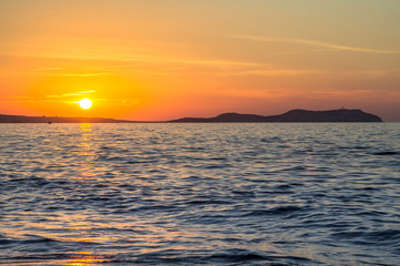 Obraz premium Sunset over sea