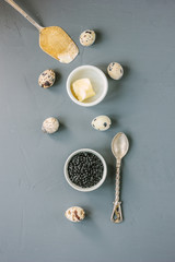 Fototapeta na wymiar Top view of black caviar in white ceramic bowl.