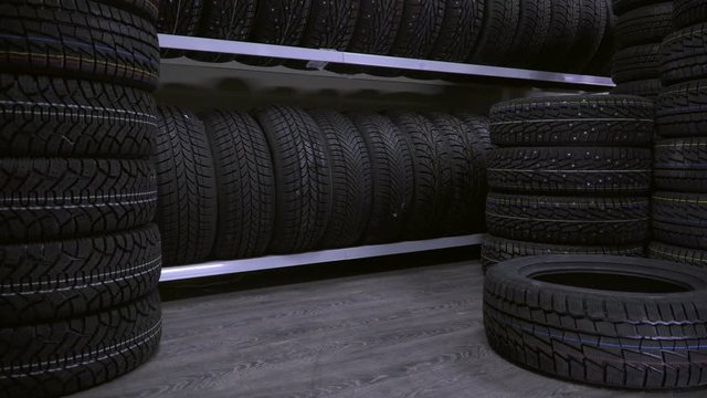 The tire fell off the shelf to the floor