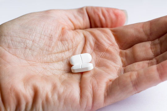 pain killers in a hand